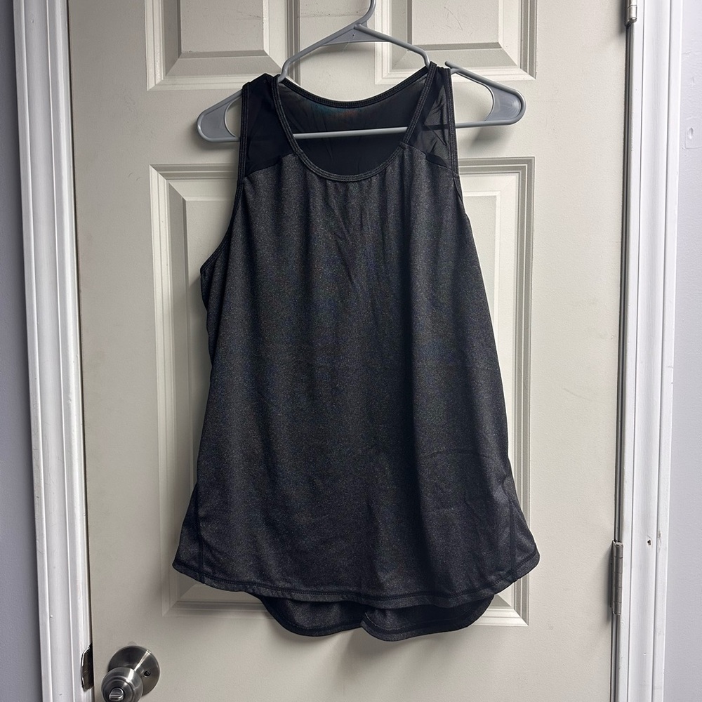 4  Sleeveless Women's Top.  1 Black, 1 Red, 1 Purple, 1 Blue.